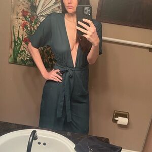 Dark green deep v pants jump suit . No name.